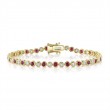 A 14K Yellow Gold Bezel Set Tennis Bracelet