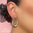 A Pair Of 14K Yellow Gold Oval Shaped Dangle Earrings