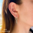 A Pair Of 14K White Gold Diamond Oval Drop Earrings
