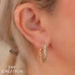 A 14K Yellow Gold Crossover Style Hoop Earrings
