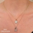 A 14K Yellow And White Gold Necklace Diamond Pave Oval Necklace