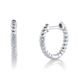 A Pair Of 14K White Gold Diamond Huggie Hoop Earrings