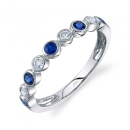 A 14K White Gold Ring Bezel Set