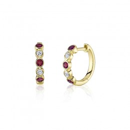 A Pair Of 14K Yellow Gold Huggie Hoop Earrings