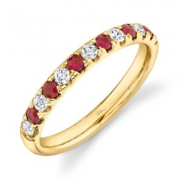 A 14K Yellow Gold, Ruby And Diamond Band. 6 Rubies= .30 Carat And 7 Diamonds= .30 Carat G/H Vs/Si. Finger Size 10.5. Special Orders Are All Sales Final.