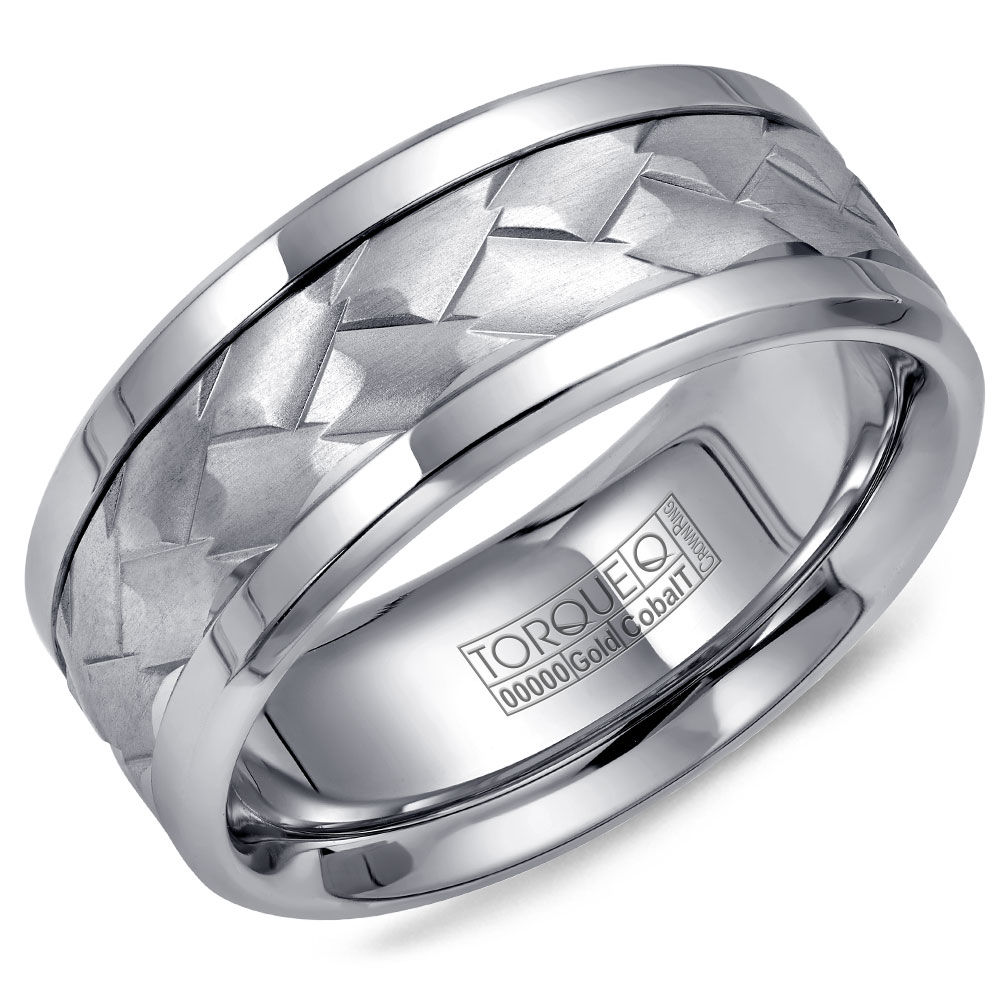 A Torque Ring In White Cobalt With A Carved White Gold Center.