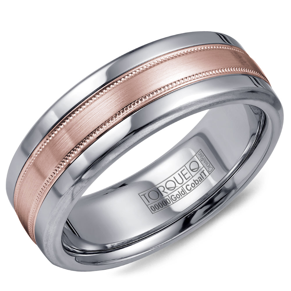 A Torque Ring In White Cobalt With A Brushed Rose Gold Center And Milgrain Detailing.