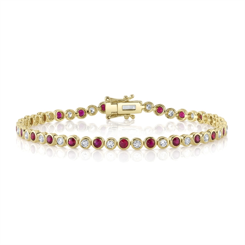 A 14K Yellow Gold Bezel Set Tennis Bracelet