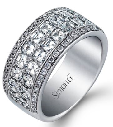 Wide platinum band style ring that is Simon-set